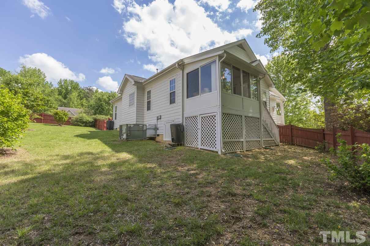 826 Shackleton Road Apex, NC 27502 - Photo 11 of 24 a view of a house with a yard