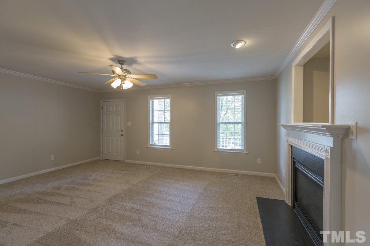 826 Shackleton Road Apex, NC 27502 - Photo 13 of 24 a view of livingroom with window