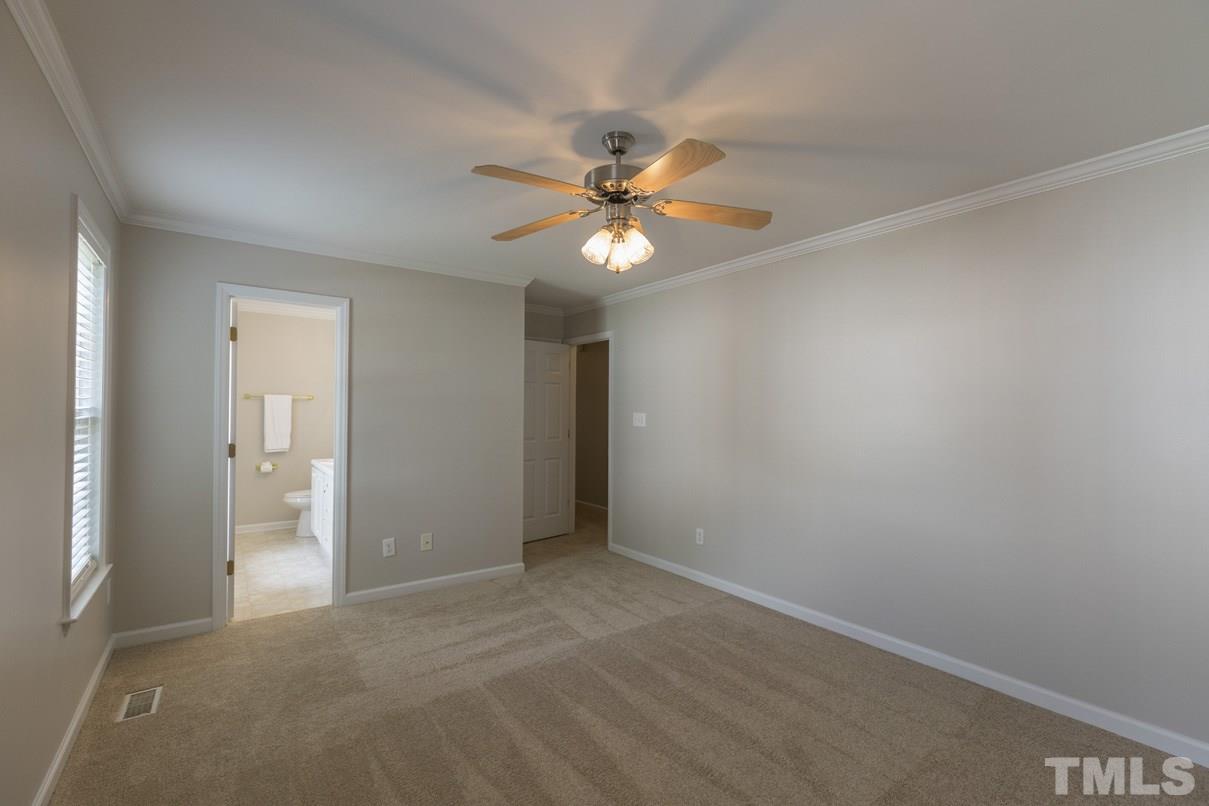 826 Shackleton Road Apex, NC 27502 - Photo 16 of 24 a view of an empty room