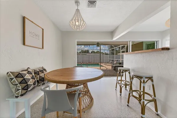 a view of a dining room with furniture