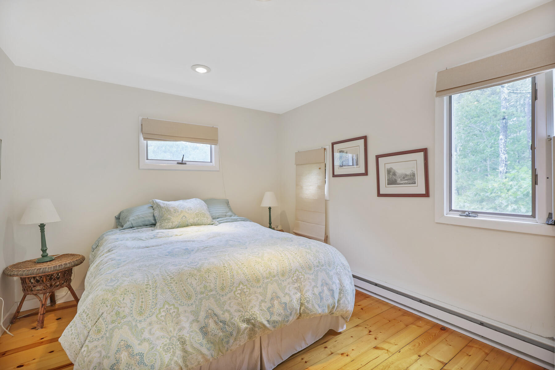 20 Pine Valley Road Wellfleet, MA 02667 - Photo 17 of 52 a bedroom with a bed and a painting on the wall