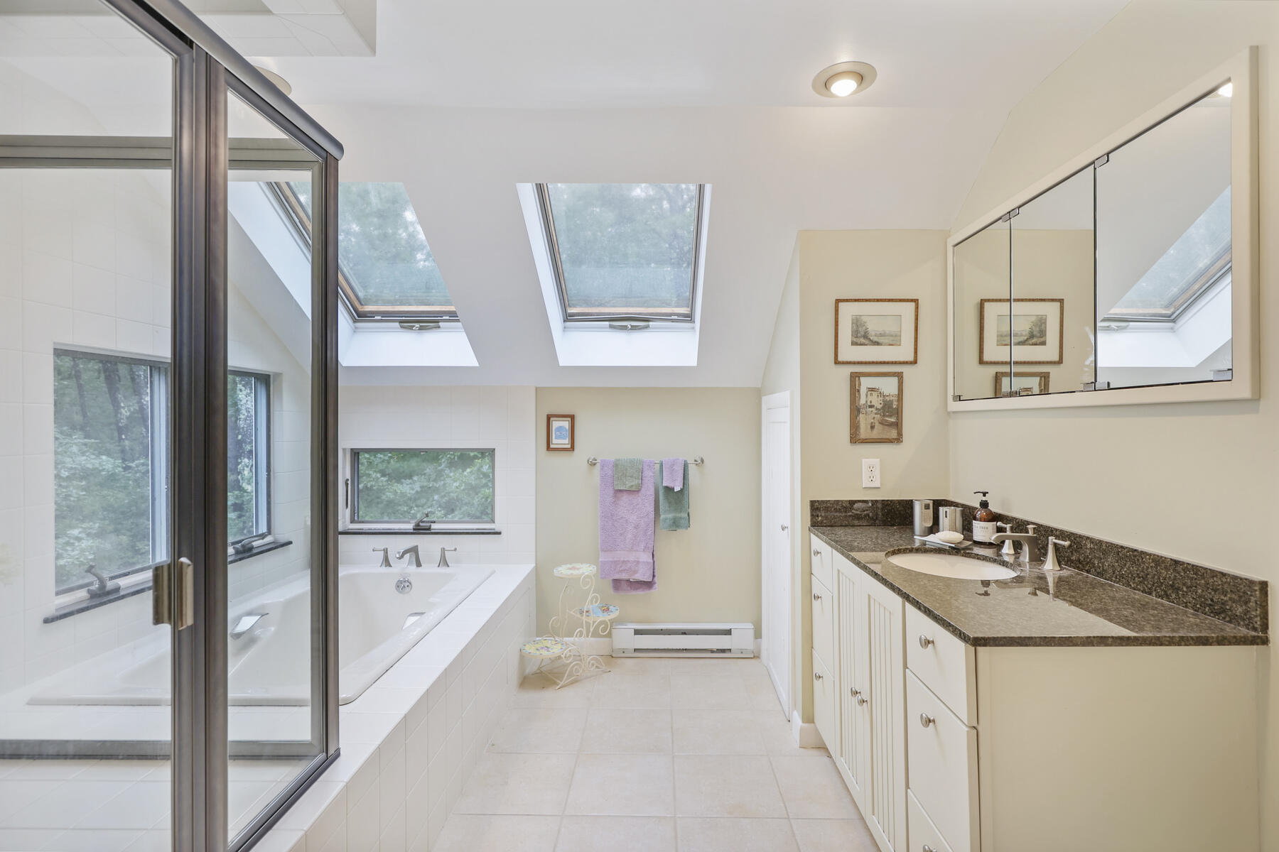 20 Pine Valley Road Wellfleet, MA 02667 - Photo 19 of 52 a bathroom with a granite countertop sink a mirror a bathtub and next to a window
