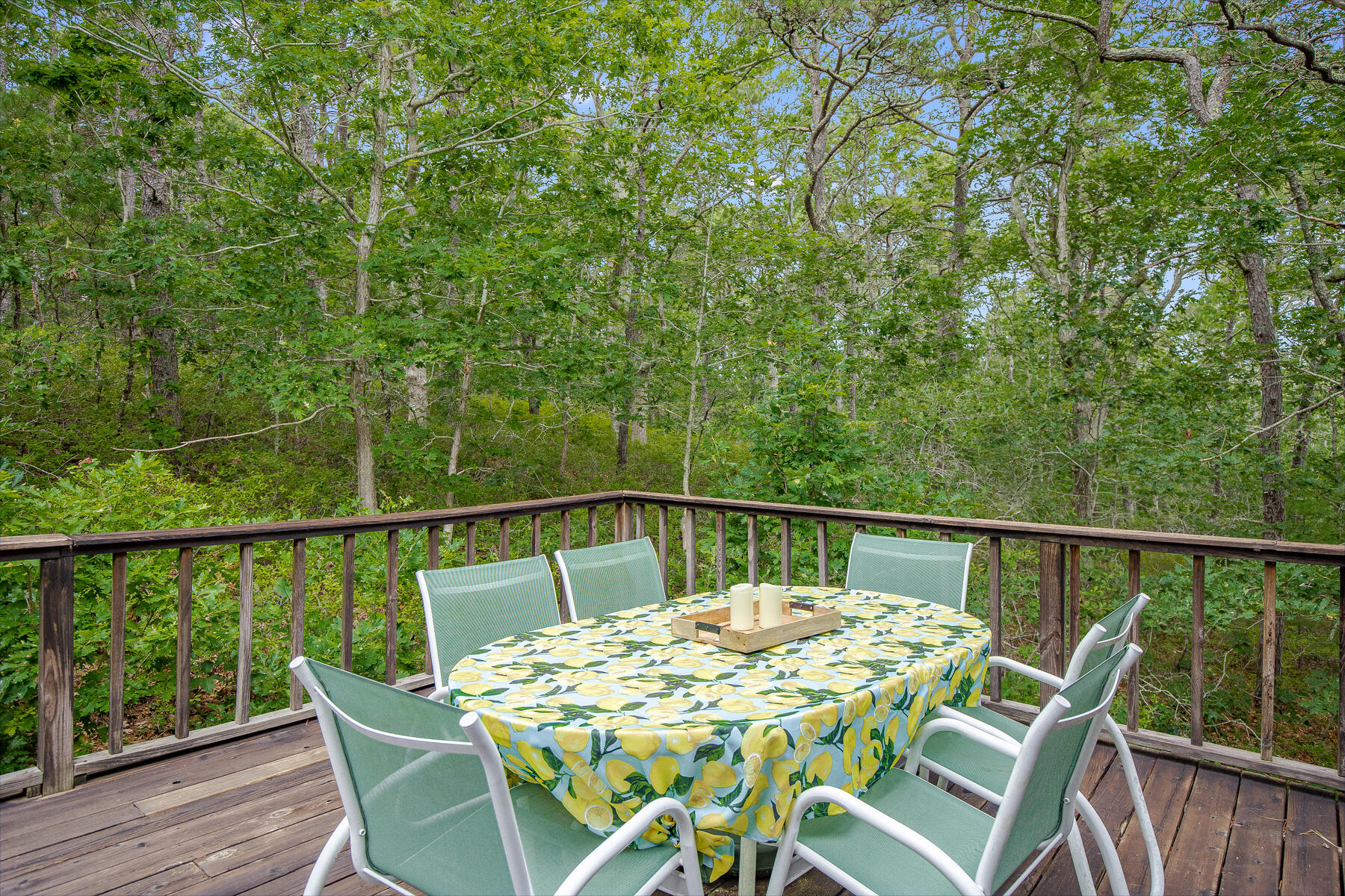 20 Pine Valley Road Wellfleet, MA 02667 - Photo 22 of 52 a balcony with wooden floor table and chairs
