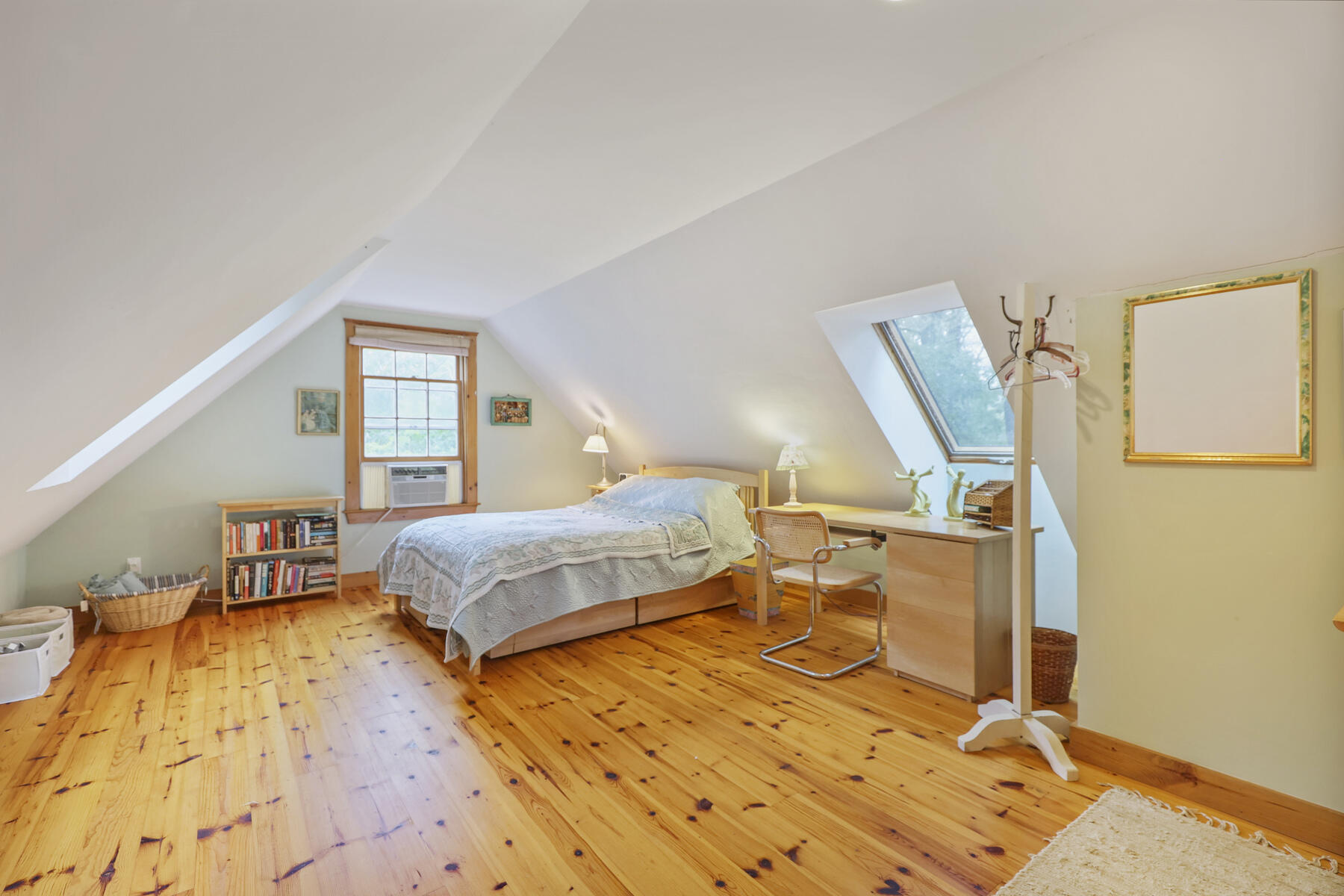 20 Pine Valley Road Wellfleet, MA 02667 - Photo 36 of 52 a bedroom with a bed and wooden floor
