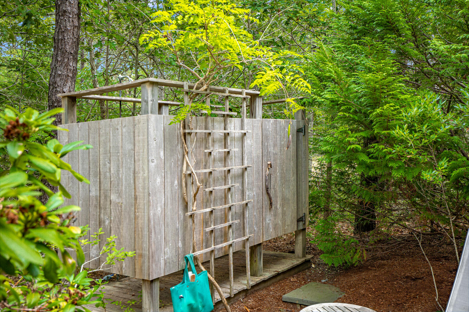 20 Pine Valley Road Wellfleet, MA 02667 - Photo 42 of 52 a view of a pathway of a building with wooden fence