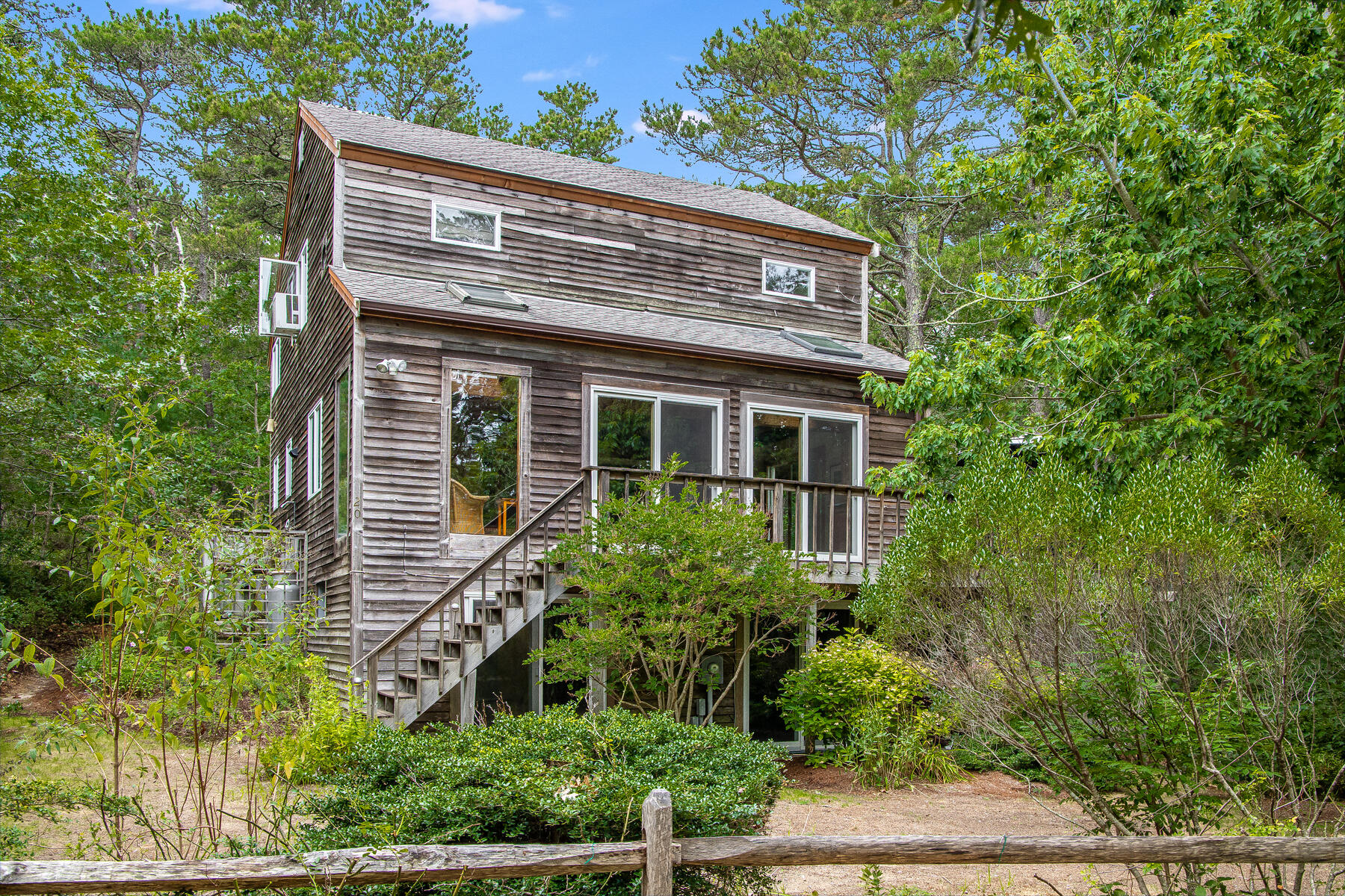 20 Pine Valley Road Wellfleet, MA 02667 - Photo 47 of 52 a view of house with an outdoor space
