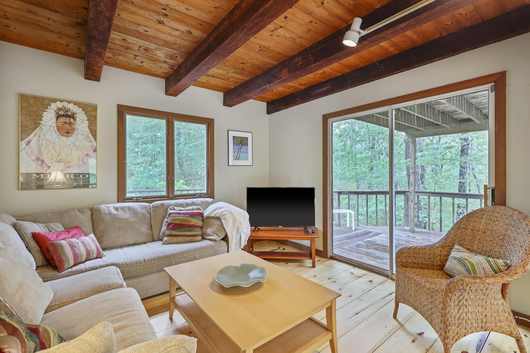 20 Pine Valley Road Wellfleet, MA 02667 - Photo 5 of 52 a living room with furniture and a flat screen tv