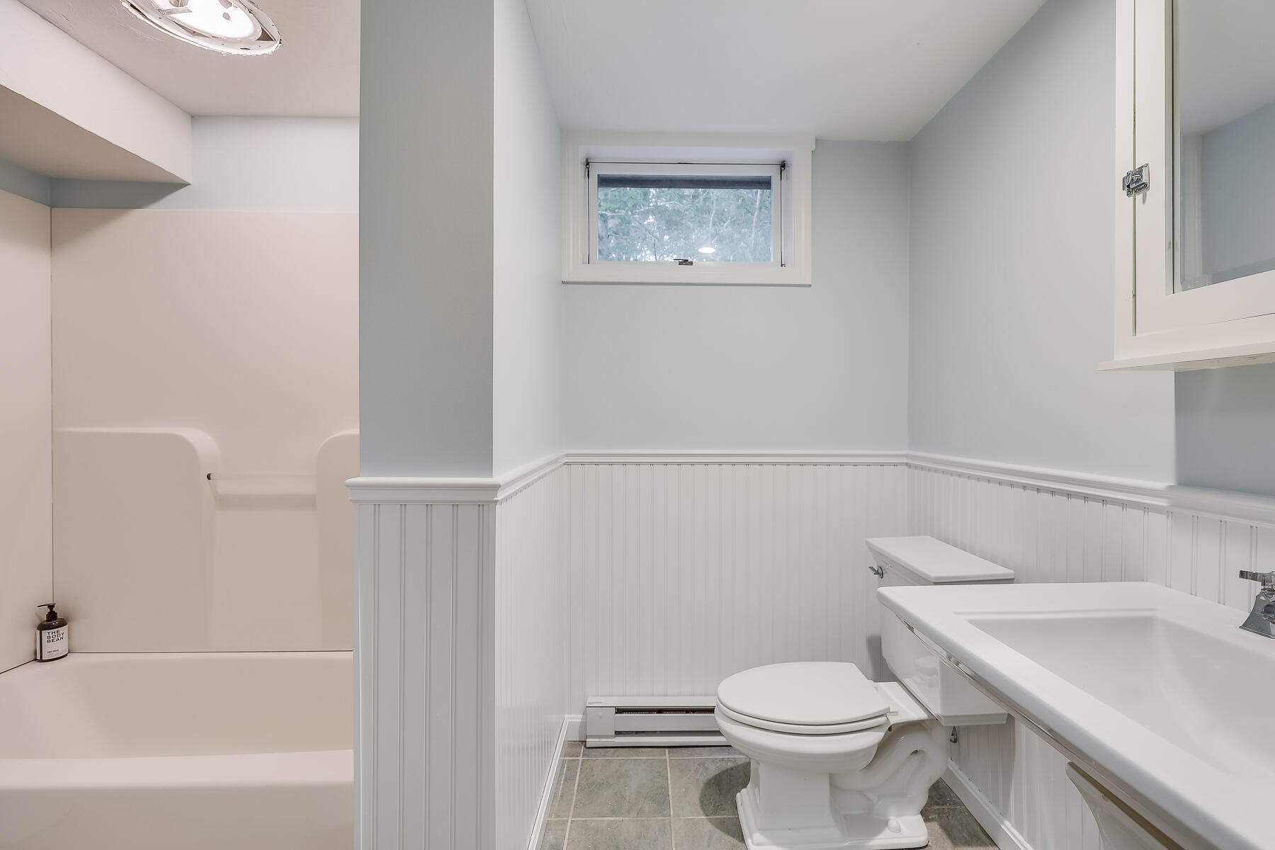 20 Pine Valley Road Wellfleet, MA 02667 - Photo 52 of 52 a white toilet sitting next to a bathroom sink