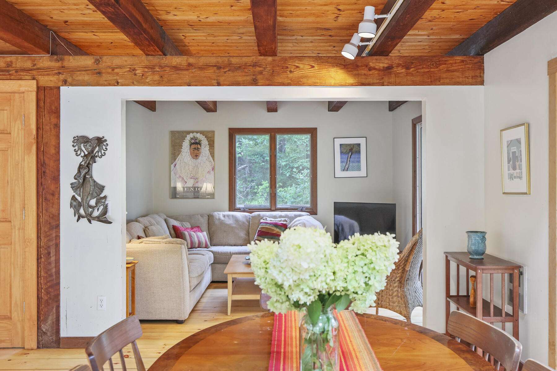 20 Pine Valley Road Wellfleet, MA 02667 - Photo 6 of 52 a living room with furniture and a potted plant