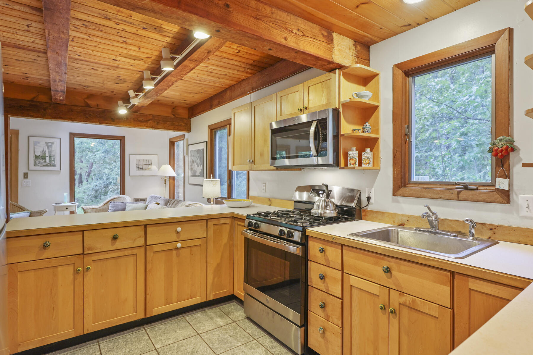 20 Pine Valley Road Wellfleet, MA 02667 - Photo 9 of 52 a kitchen with sink cabinets and window
