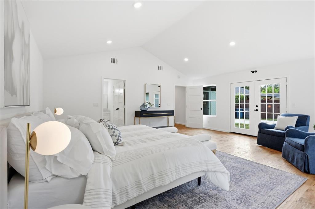 6811 Patrick Drive Dallas, TX 75214 - Photo 26 of 40 Bedroom featuring french doors, access to outside, light wood-style floors, high vaulted ceiling, and recessed lighting