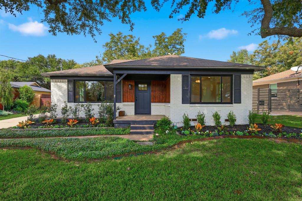 6811 Patrick Drive Dallas, TX 75214 - Photo 3 of 40 View of front facade featuring brick siding and a porch