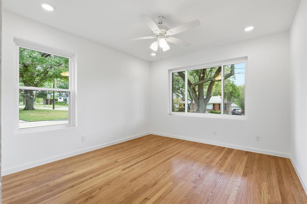 6811 Patrick Drive Dallas, TX 75214 - Photo 32 of 40 Spare room featuring recessed lighting, light wood-type flooring, and ceiling fan