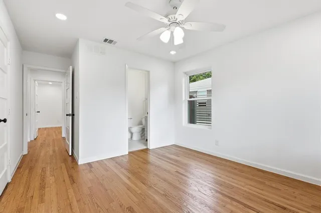 a view of livingroom with hardwood floor and ceiling fan