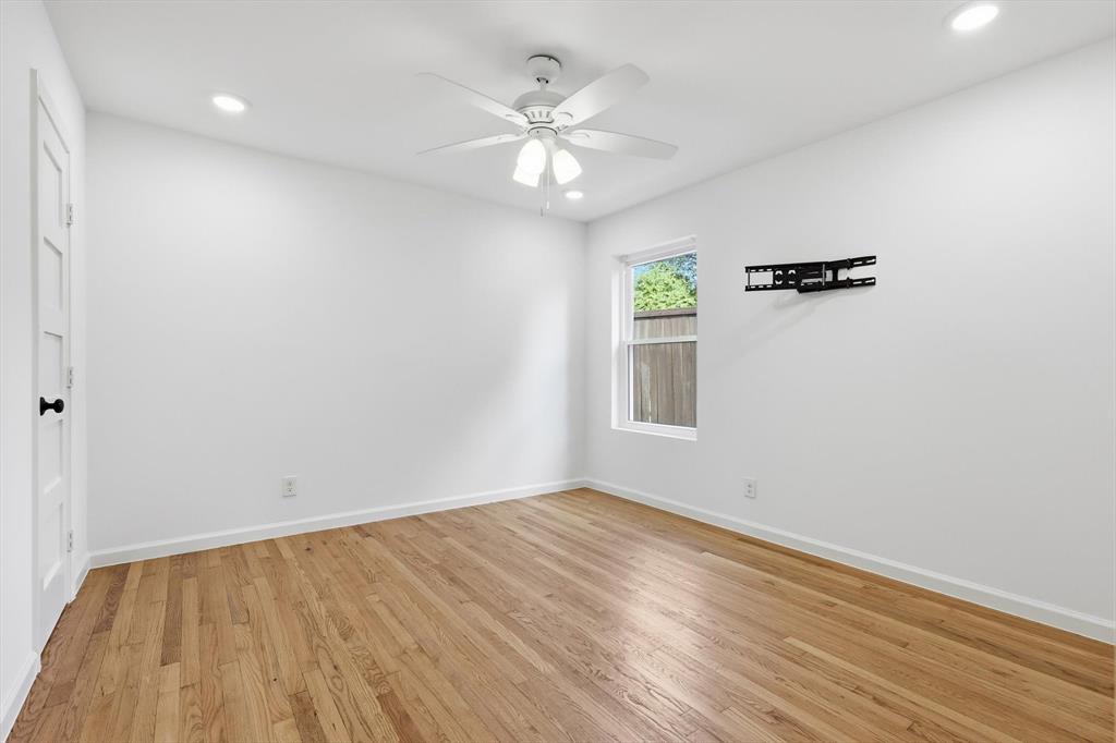 6811 Patrick Drive Dallas, TX 75214 - Photo 35 of 40 Empty room with recessed lighting, light wood-style flooring, and a ceiling fan