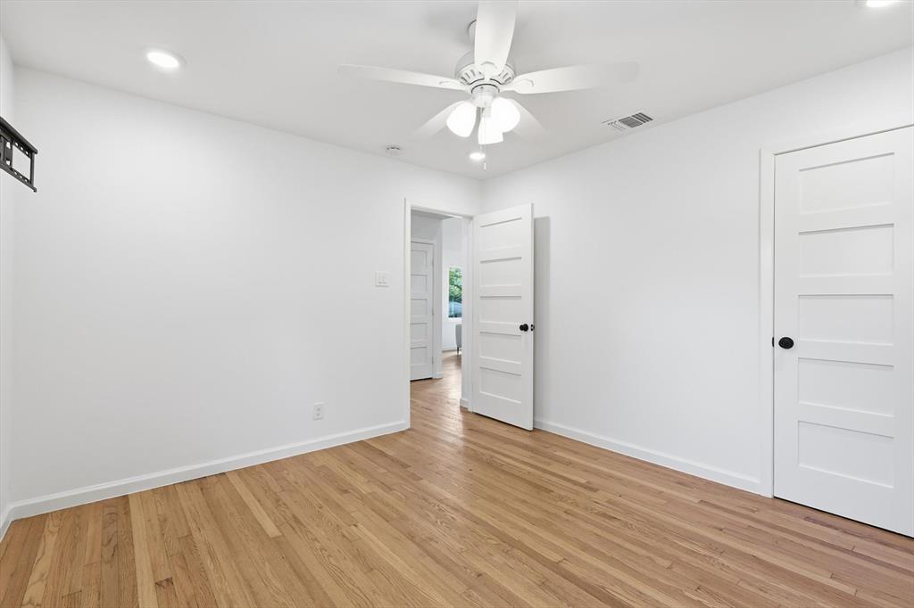 6811 Patrick Drive Dallas, TX 75214 - Photo 36 of 40 Unfurnished bedroom featuring recessed lighting, light wood-style floors, and a ceiling fan