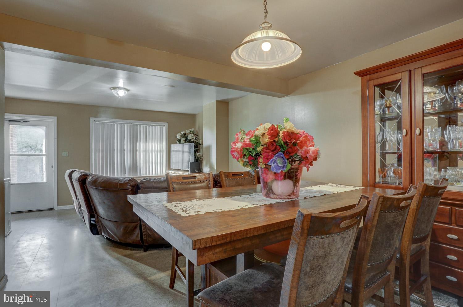 417 Green Street Lancaster, PA 17602 - Photo 14 of 37 a view of a dining room with furniture and chandelier