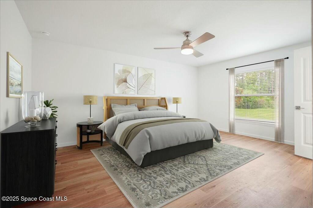991 Pandora Road Southeast Palm Bay, FL 32909 - Photo 5 of 11 Primary bedroom