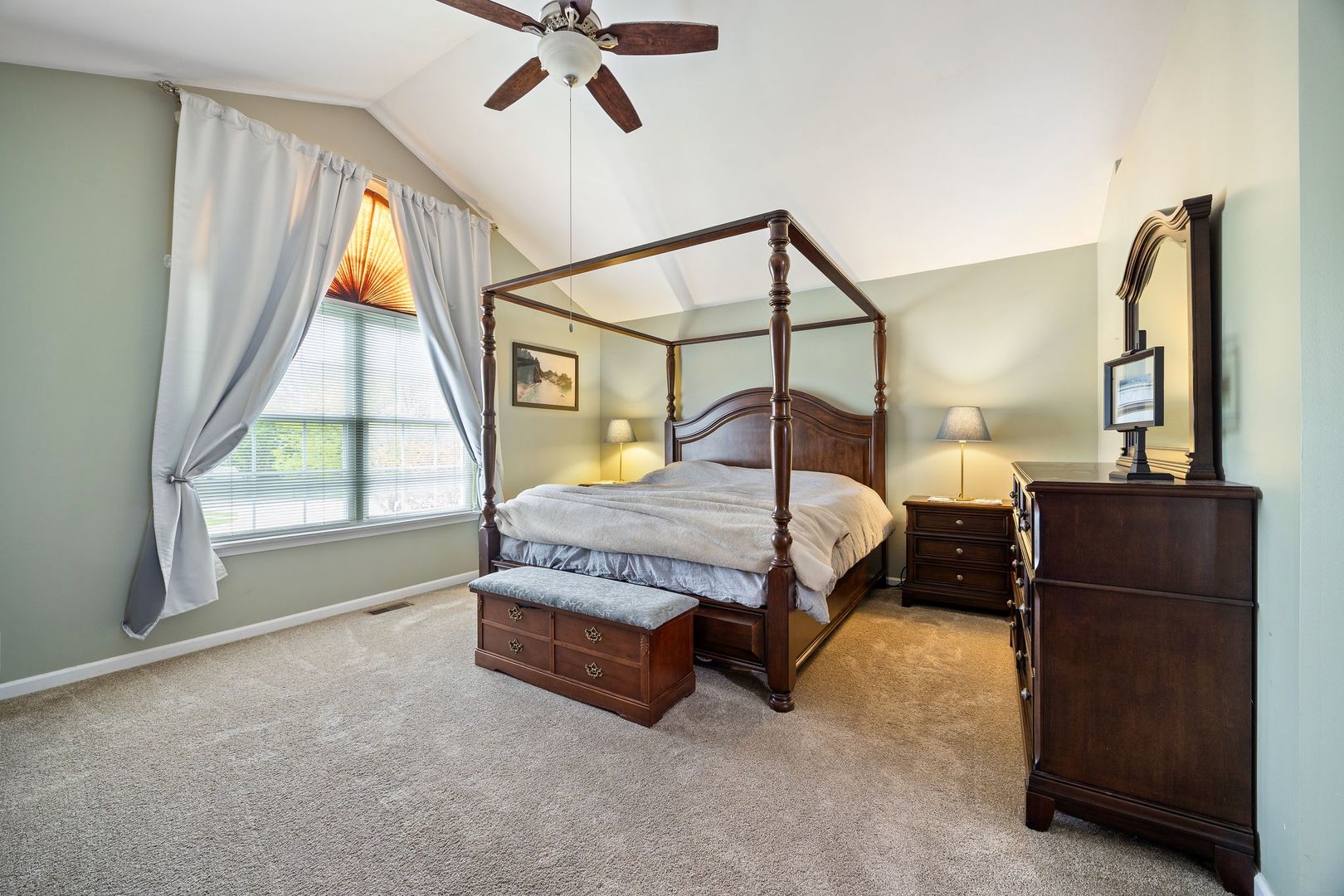 7781 Rippling Ridge Court Gurnee, IL 60031 - Photo 16 of 31 a bedroom with a bed window and dresser