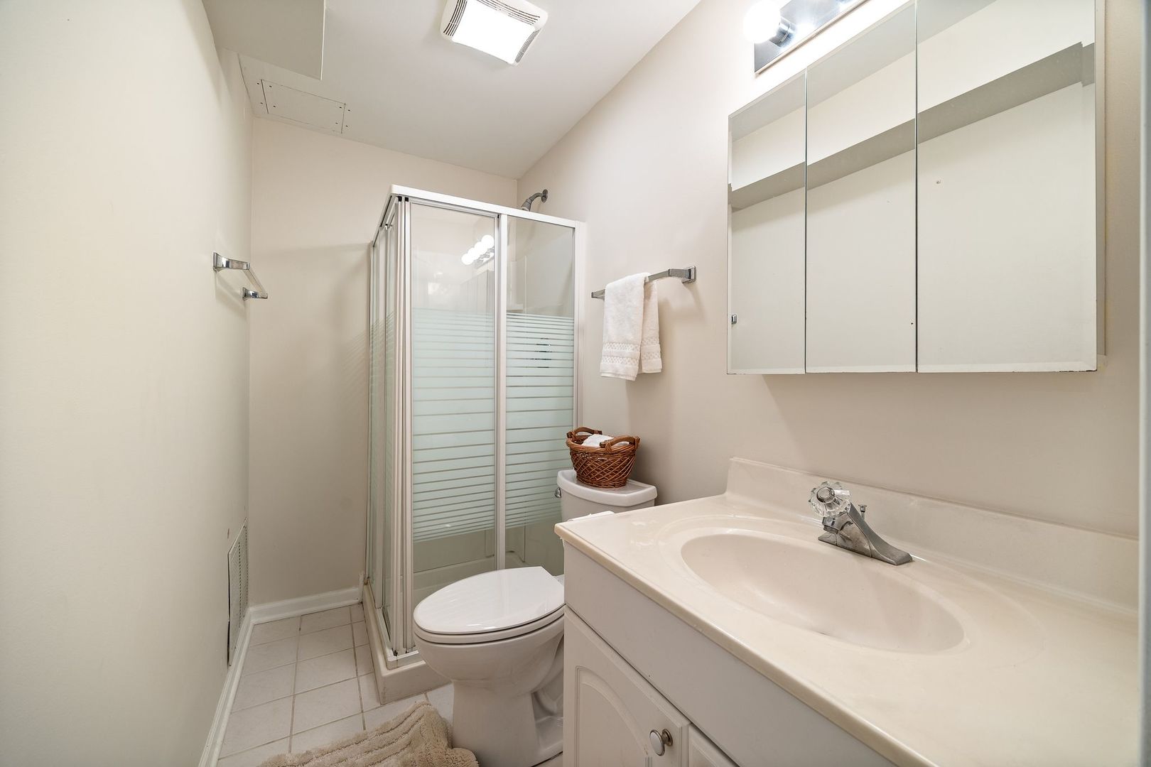 7781 Rippling Ridge Court Gurnee, IL 60031 - Photo 26 of 31 a bathroom with a sink a toilet and shower