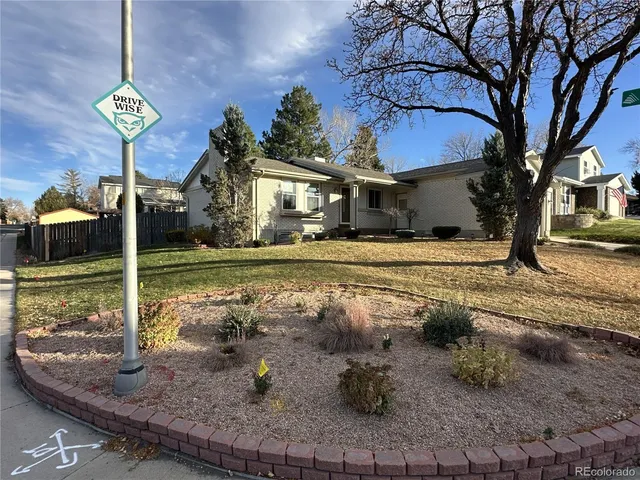 a view of a house with fire pit