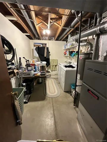 a view of a backyard with plants and patio