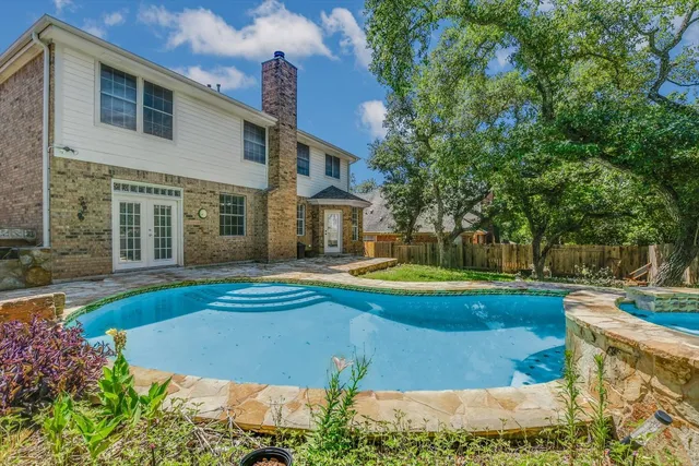 a view of outdoor space yard swimming pool and patio