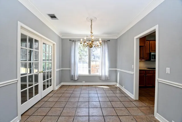a view of an empty room and window