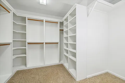 a view of an empty walk in closet