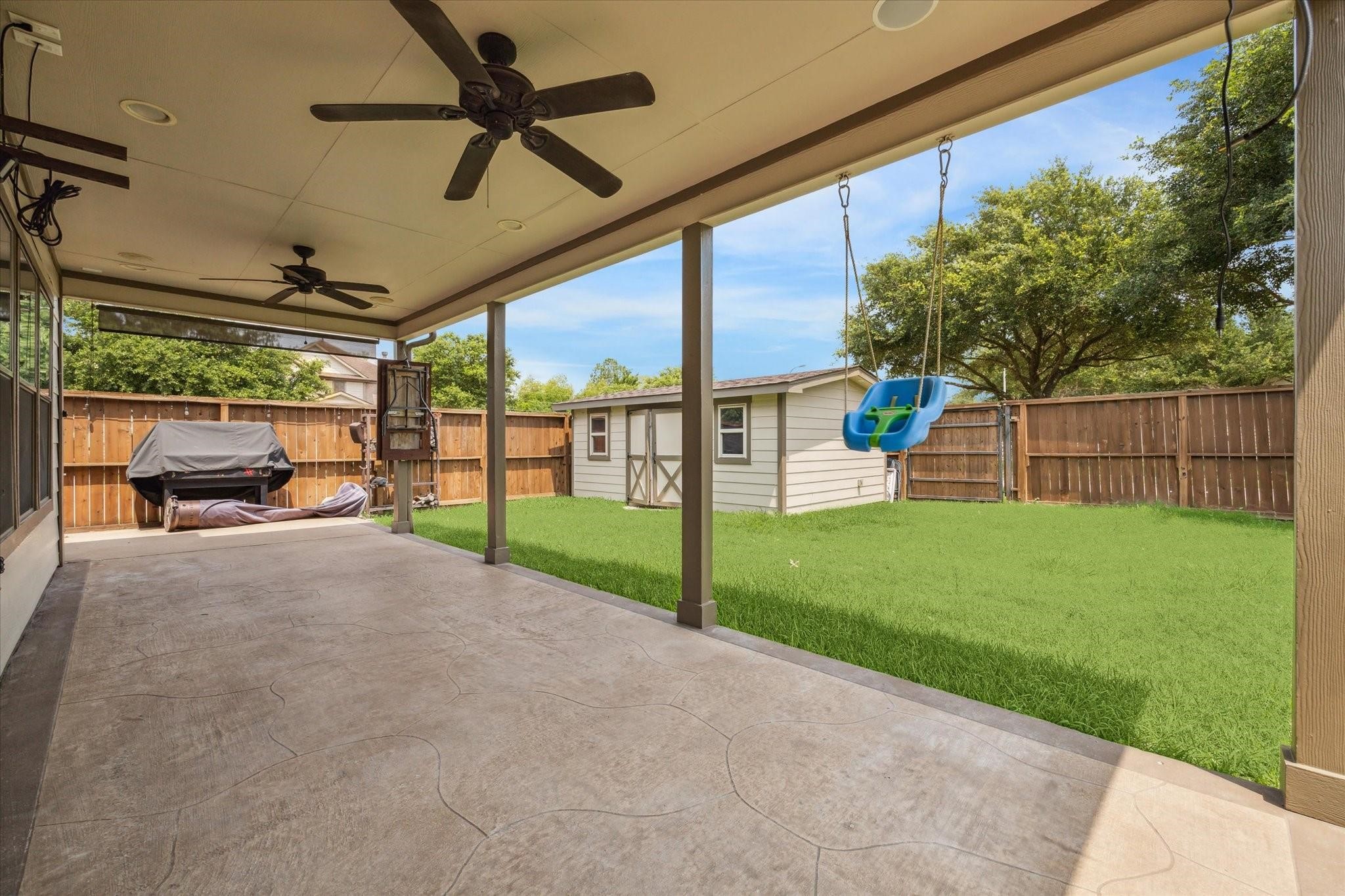 2950 Valiant Scene Court Houston, TX 77038 - Photo 19 of 21 a view of a backyard with wooden fence
