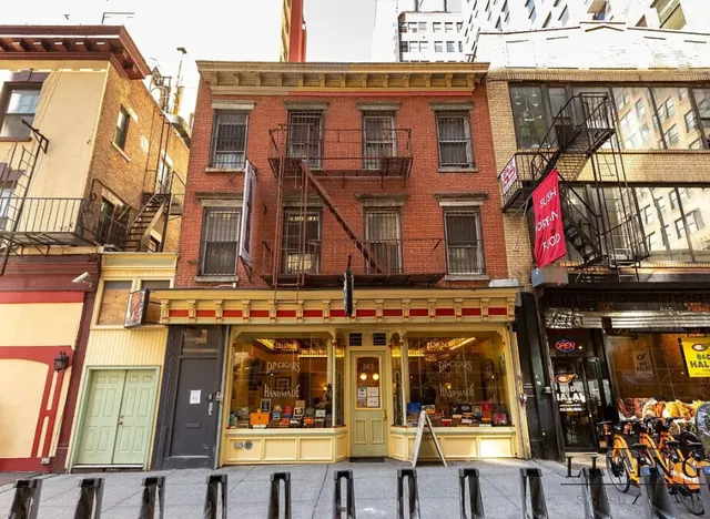 a front view of a building with glass windows