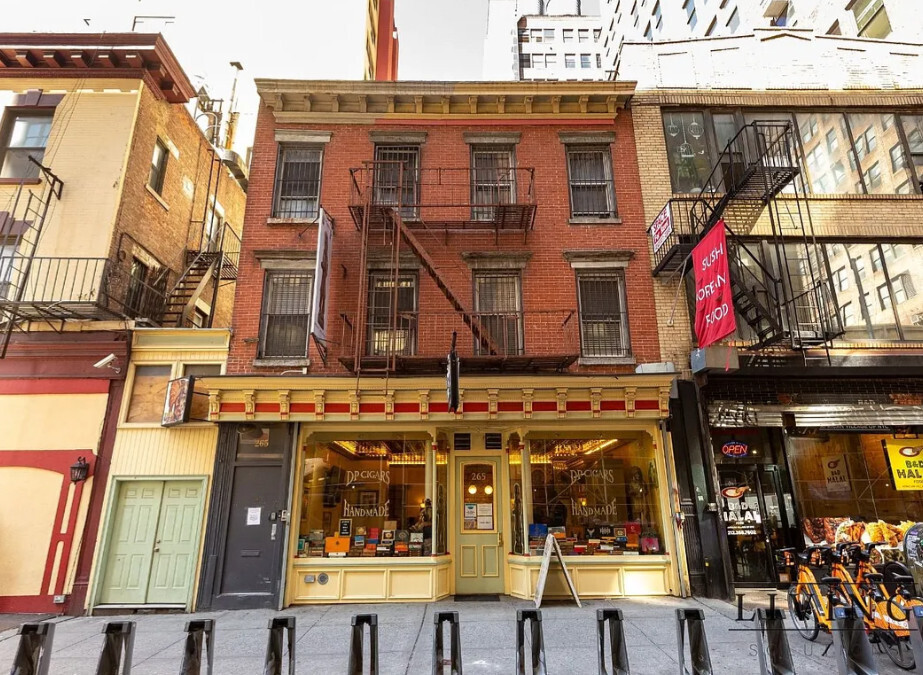 a front view of a building with glass windows