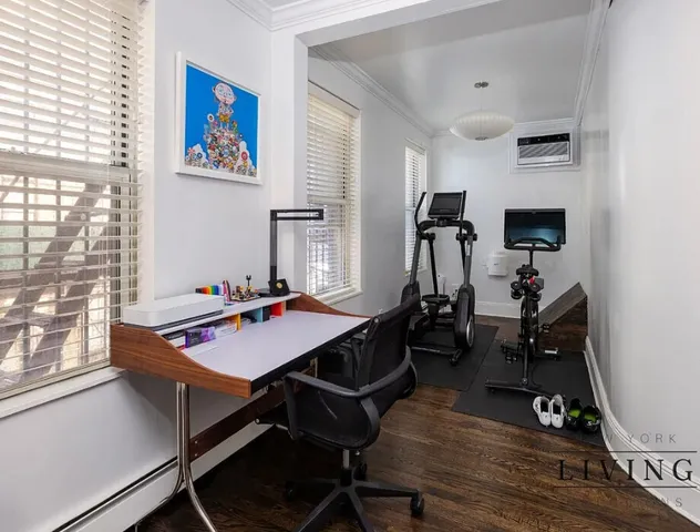 a room with furniture and a window