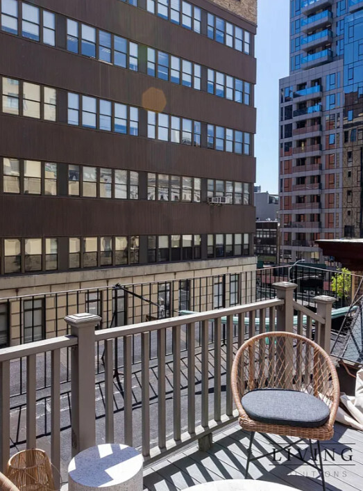 265 West 30th Street Manhattan, NY 10001 - Photo 14 of 20 a balcony view with a seating space