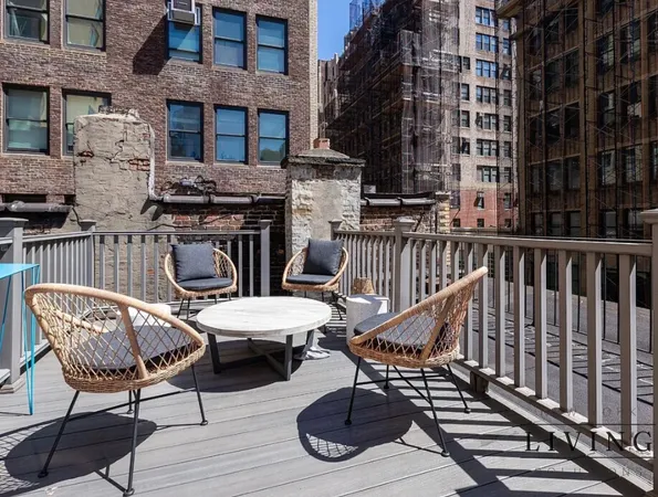 a view of a chairs and tables on the deck