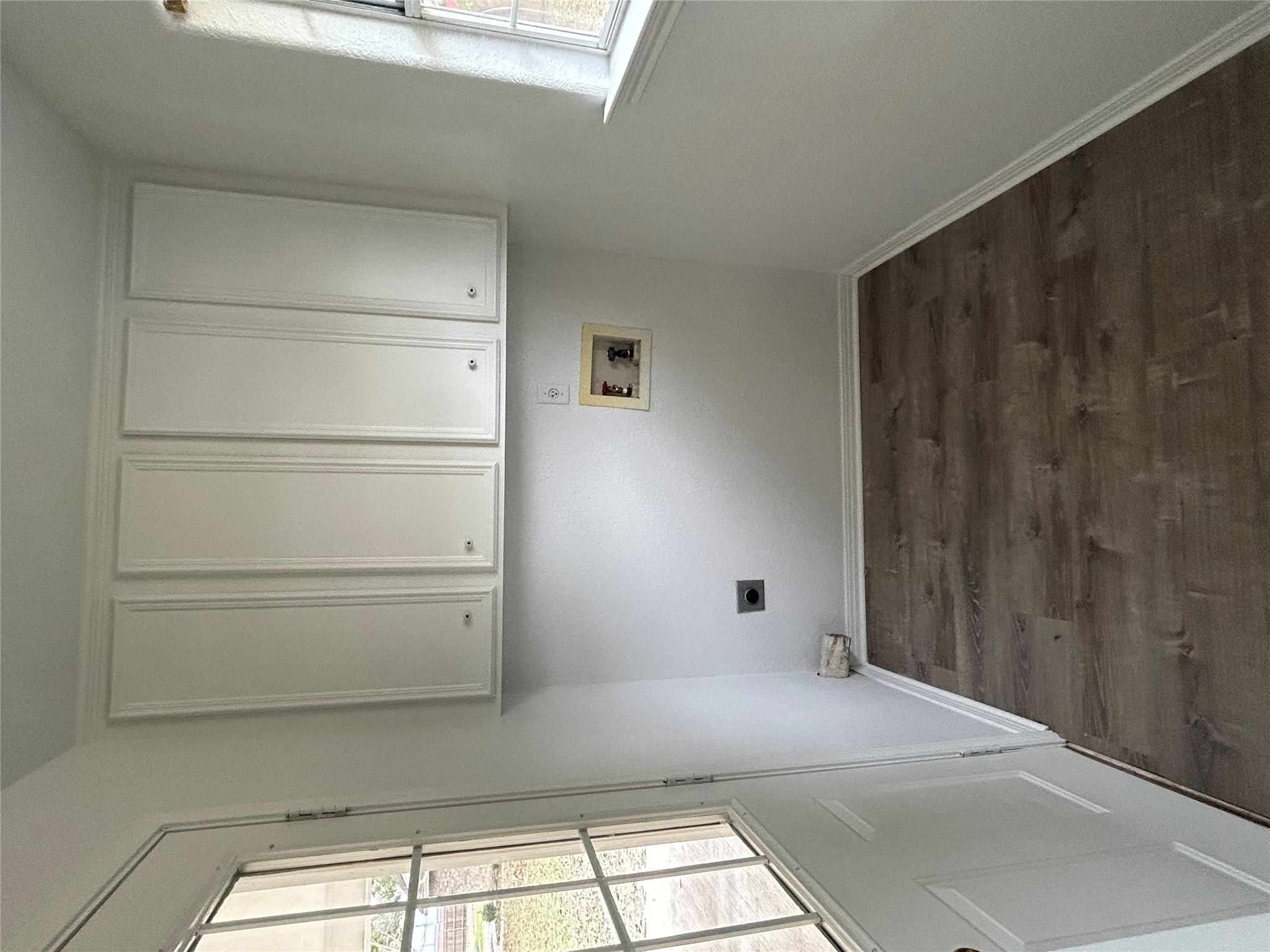 203 Maynard Street Bastrop, TX 78602 - Photo 12 of 27 an empty room with cabinet