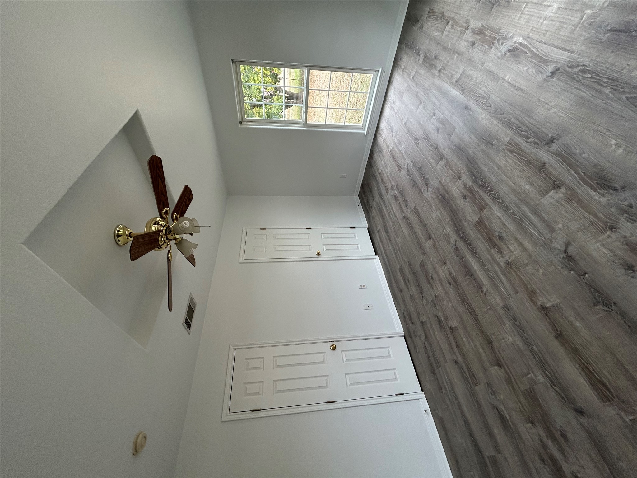 203 Maynard Street Bastrop, TX 78602 - Photo 22 of 27 a view of an empty room with a window