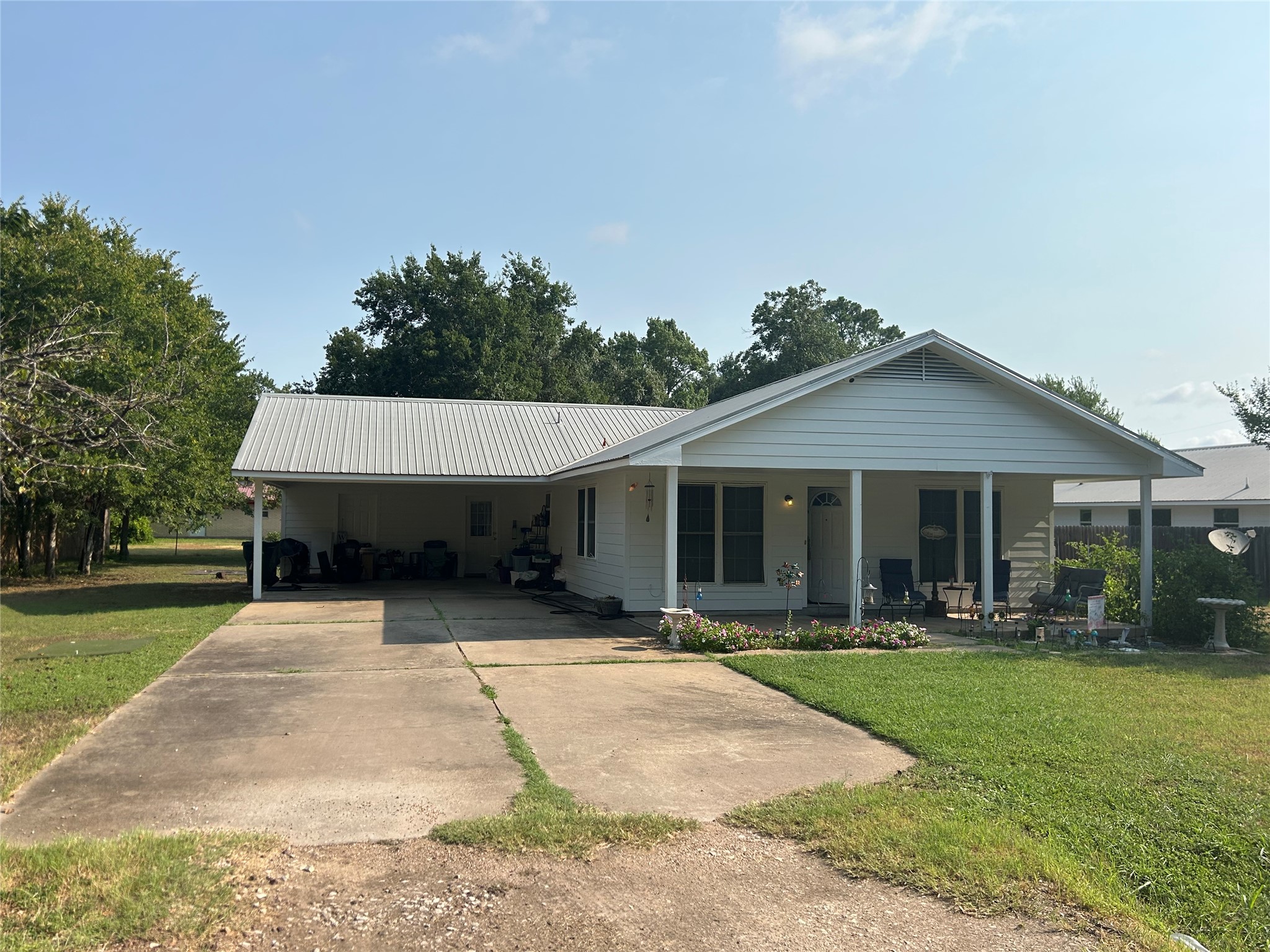 203 Maynard Street Bastrop, TX 78602 - Photo 27 of 27 a front view of house with yard outdoor seating and green space