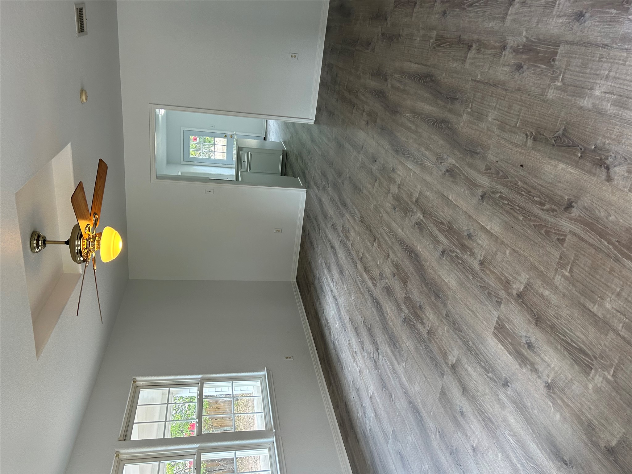 203 Maynard Street Bastrop, TX 78602 - Photo 3 of 27 a view of an empty room with window