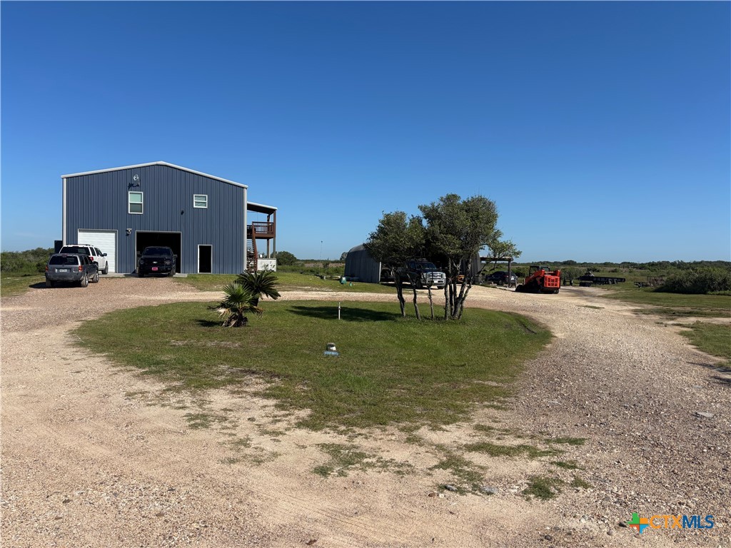 174 Riley Lane Port O'Connor, TX 77982 - Photo 42 of 47 a view of a house with backyard