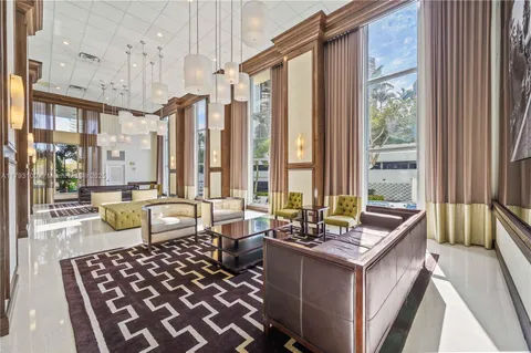 a spacious bathroom with sinks mirror and a bathtub