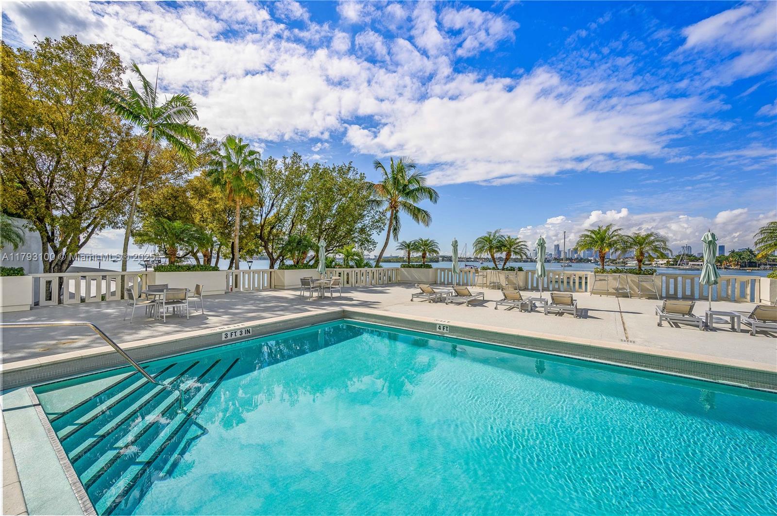 5 Island Avenue, Unit 15A Miami Beach, FL 33139 - Photo 14 of 19 a view of a swimming pool with a patio
