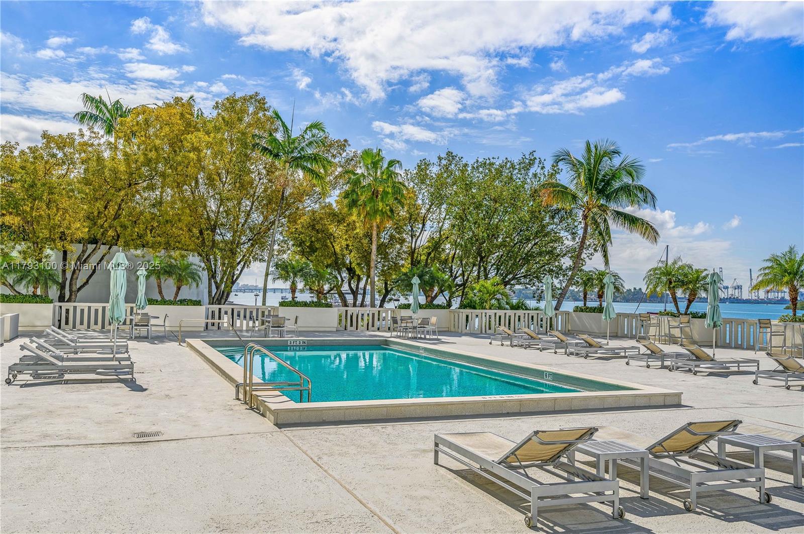 5 Island Avenue, Unit 15A Miami Beach, FL 33139 - Photo 15 of 19 a view of a swimming pool with a patio