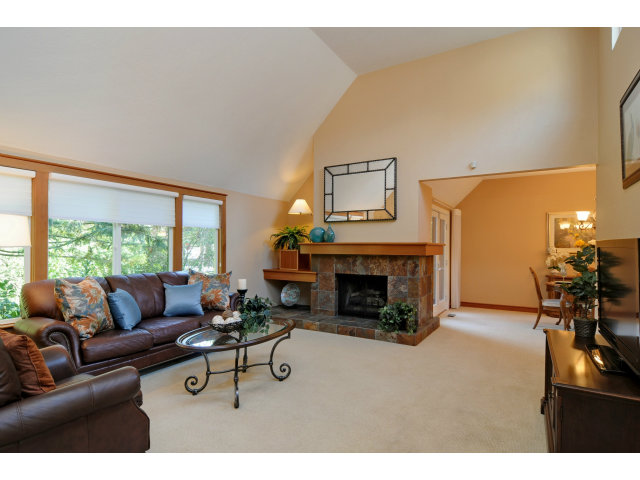 37 Farm Road Los Altos, CA 94024 - Photo 3 of 9 a living room with furniture and a fireplace
