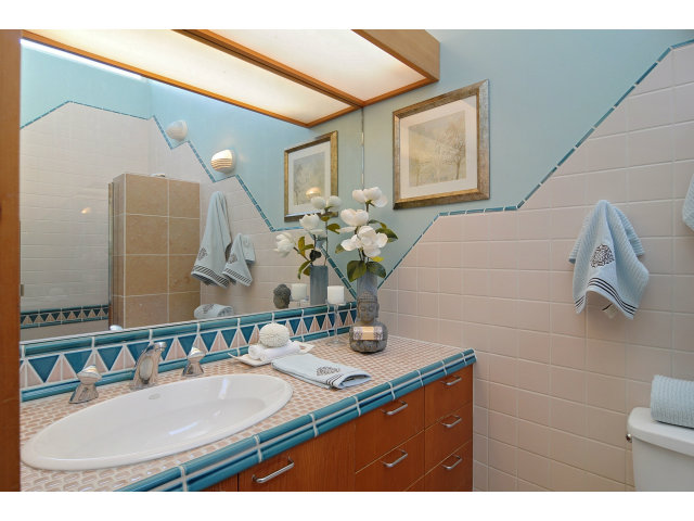 37 Farm Road Los Altos, CA 94024 - Photo 7 of 9 a bathroom with a sink vanity and a mirror