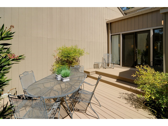 37 Farm Road Los Altos, CA 94024 - Photo 8 of 9 a view of a chairs and table in a backyard