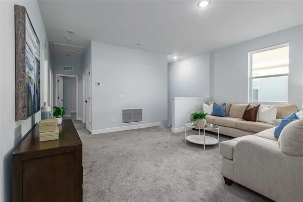 a bathroom with a sink vanity granite and a mirror