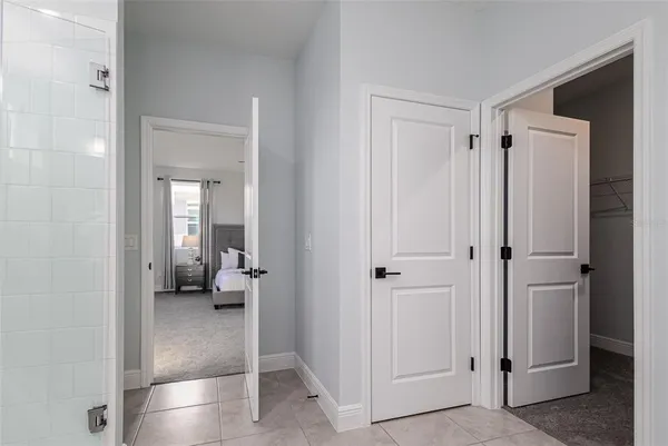 an empty room with a empty space and a ceiling fan