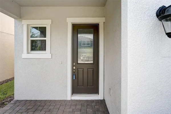 a view of a livingroom with furniture and wooden floor