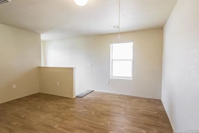 an empty room with a window